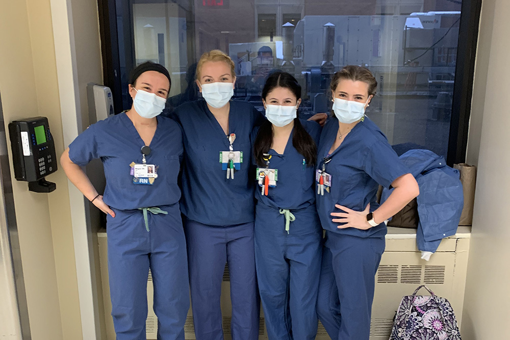 UVA Nursing grad Amelia Conner, BSN 2018, wearing mask with Northwell Hospital colleagues during 2020 COVID-19 pandemic