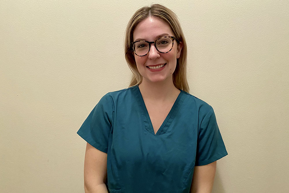 UVA Nursing grad Jessica Herren’s (BSN `18) in scrubs at NYU Langone Hospital