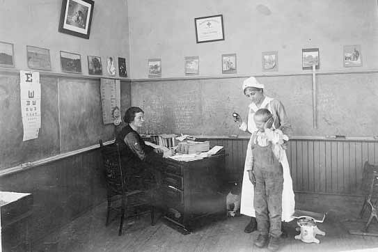 School Nurse with child in 1920