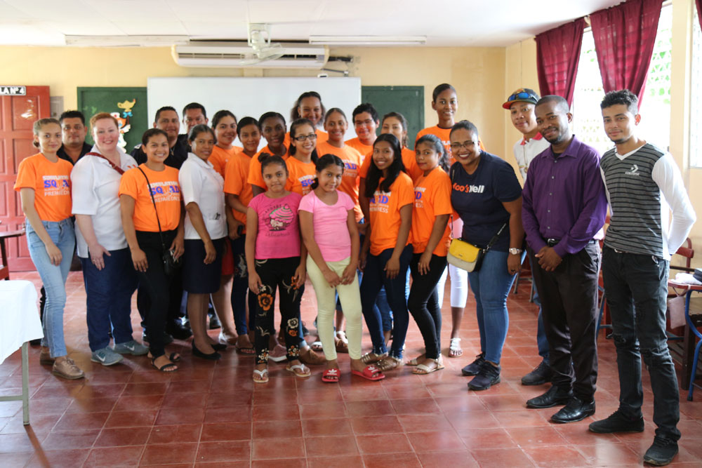 Simulation Squad students and faculty pose in classroom in Bluefields, Nicaragua