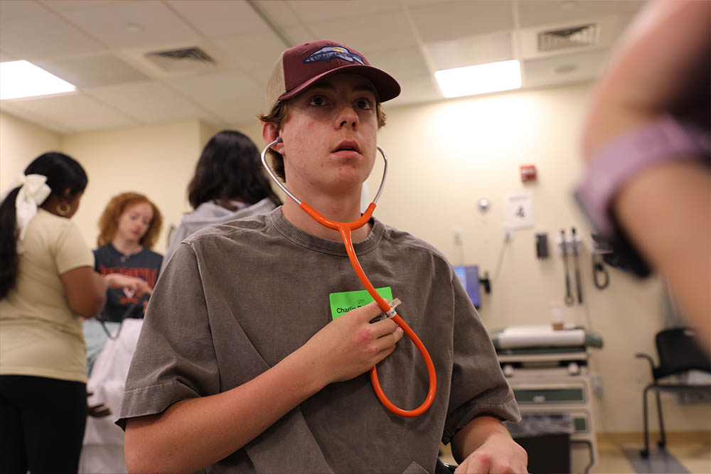 a youngster with a stethoscope