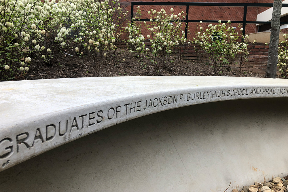 A bench in front of McLeod Hall memorializes and honors the nurses who graduated from the LPN Burley High School program during segregation.