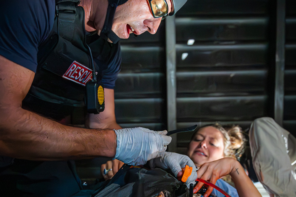 A victim receives treatment at a mass casualty training by Rhys Williams, FNP and alumnus