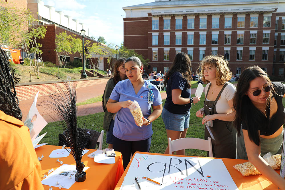 Nursing students at a table outside