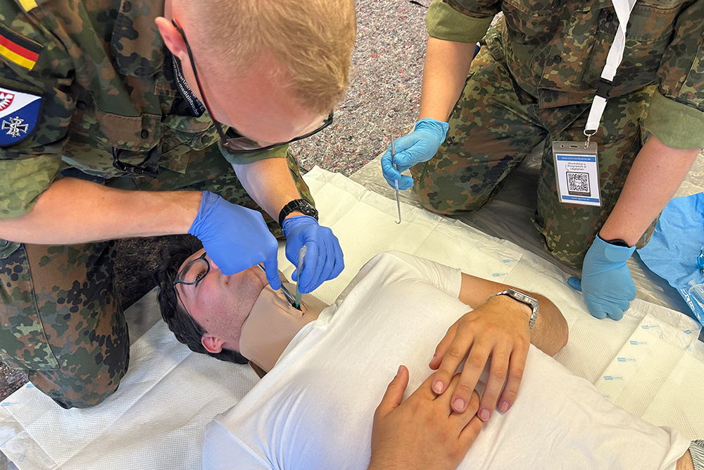 German EMTs take part in a surgical training airway in Ulm, Germany, part of a training done by alumnus and FNP Rhys Williams